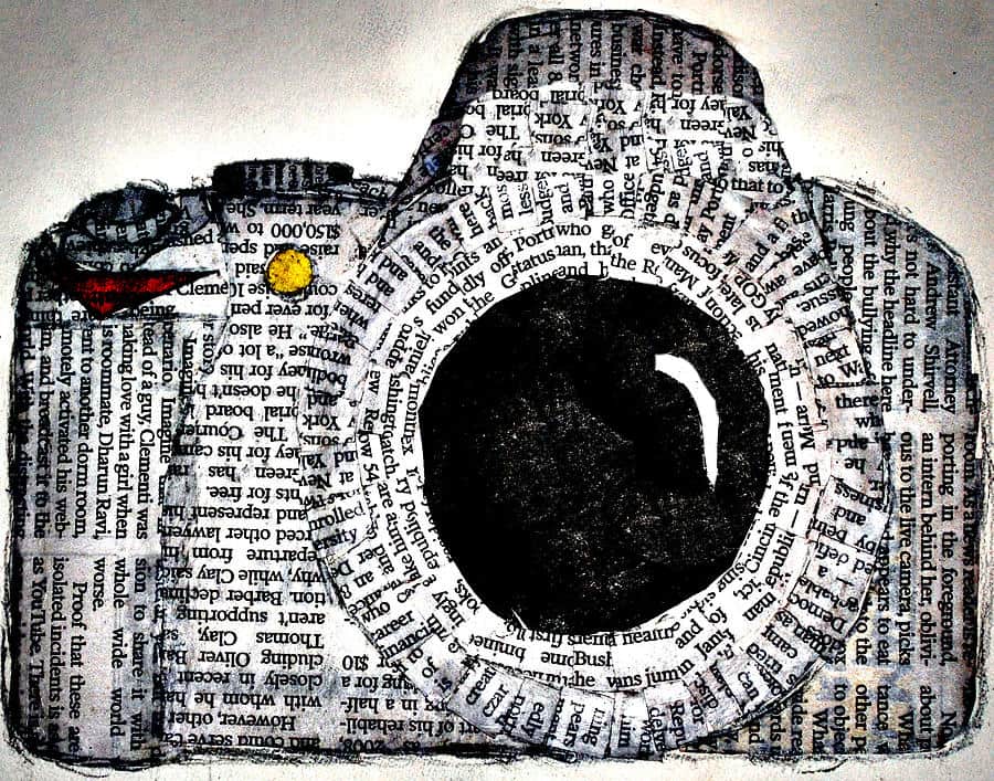 a Picture of a Camera Made Out of Newspaper.