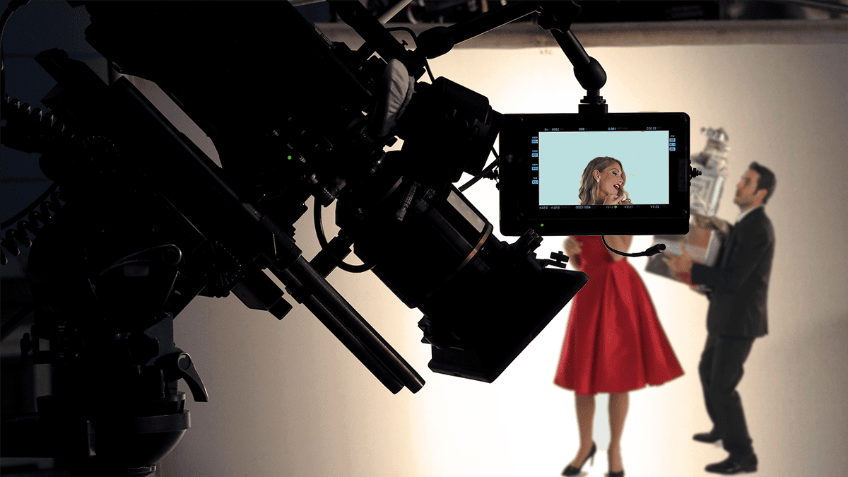 a Woman in a Red Dress Standing in Front of Camera
